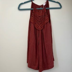 Nice tank top never worn! Size Medium.